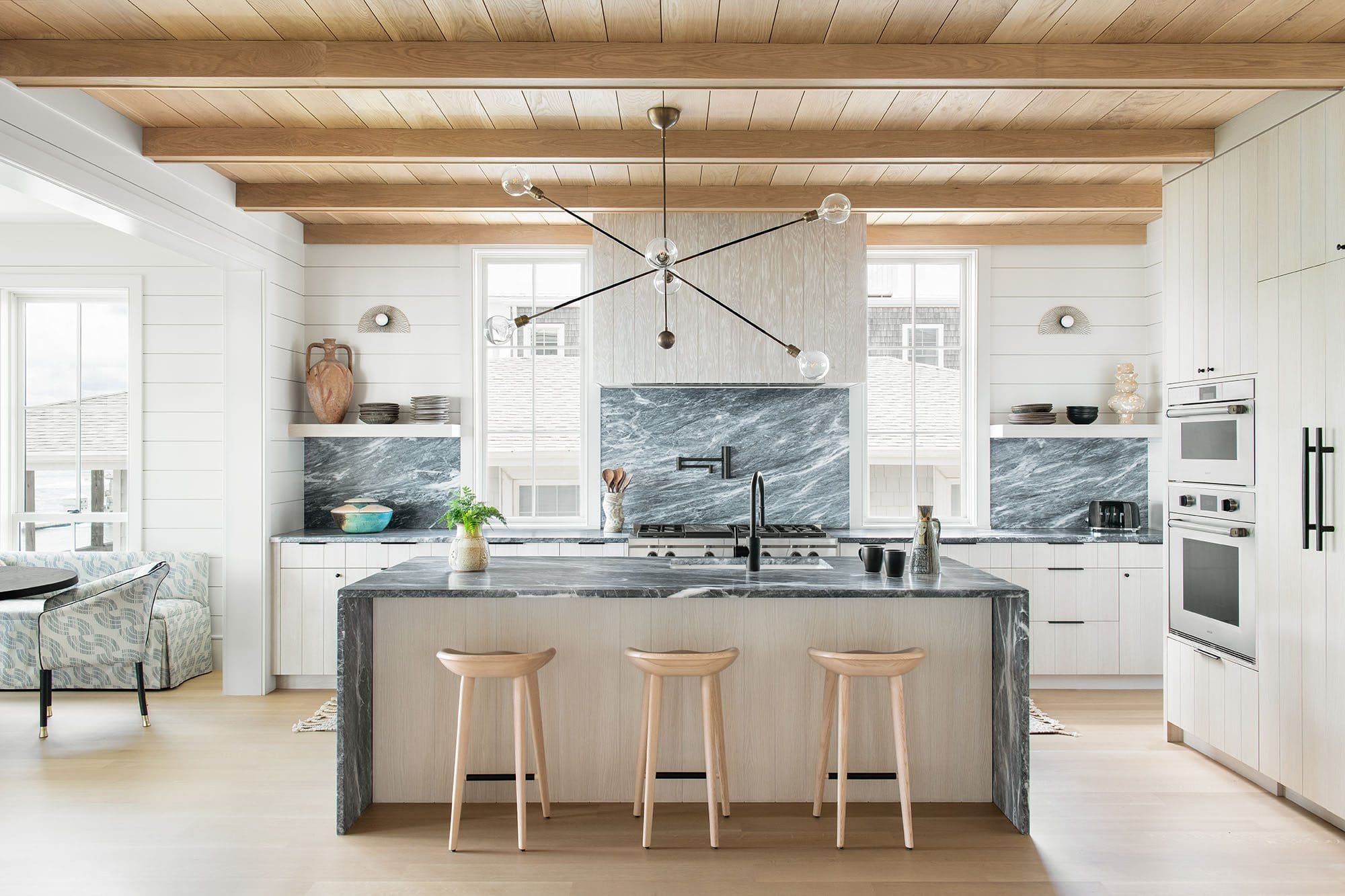 farmhouse kitchen with marble backsplash