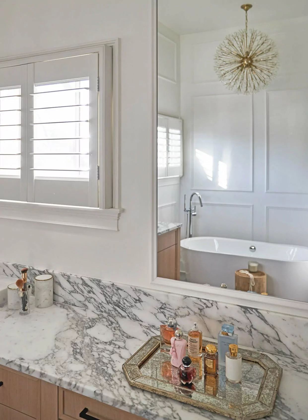 A Glen Ellyn Bathroom Remodel with Marble and Brass
