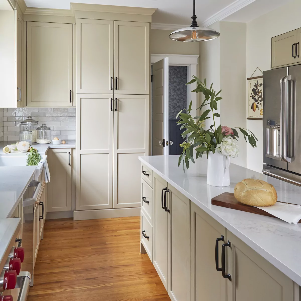beige-cabinetry-black-hardware-kitchen-design