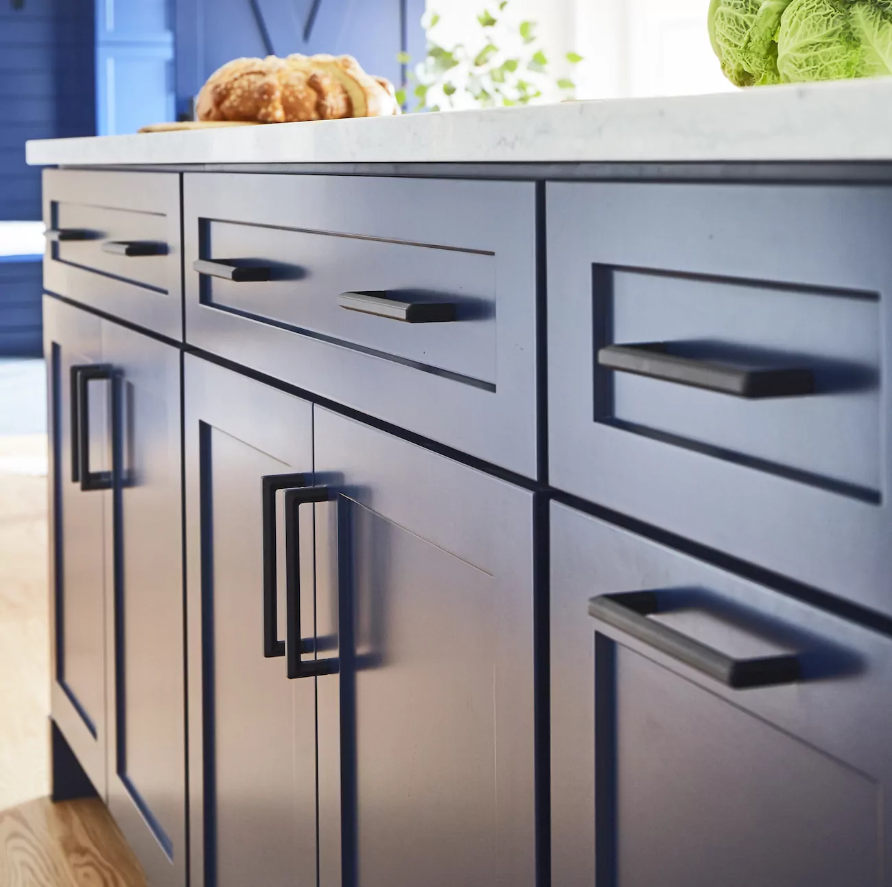 blue-cabinetry-black-hardware-kitchen-design