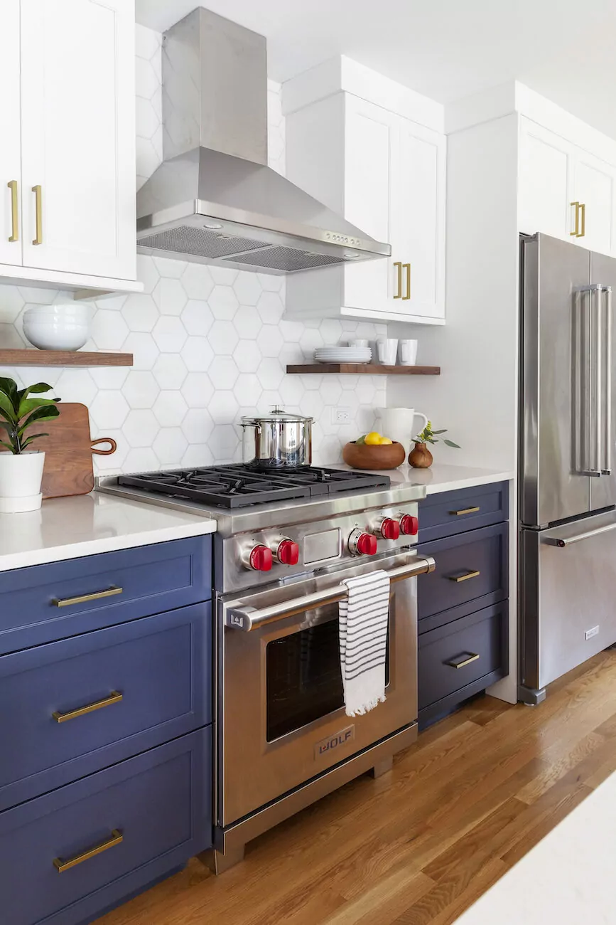 blue-cabinets-stainless-steel-range-kitchen