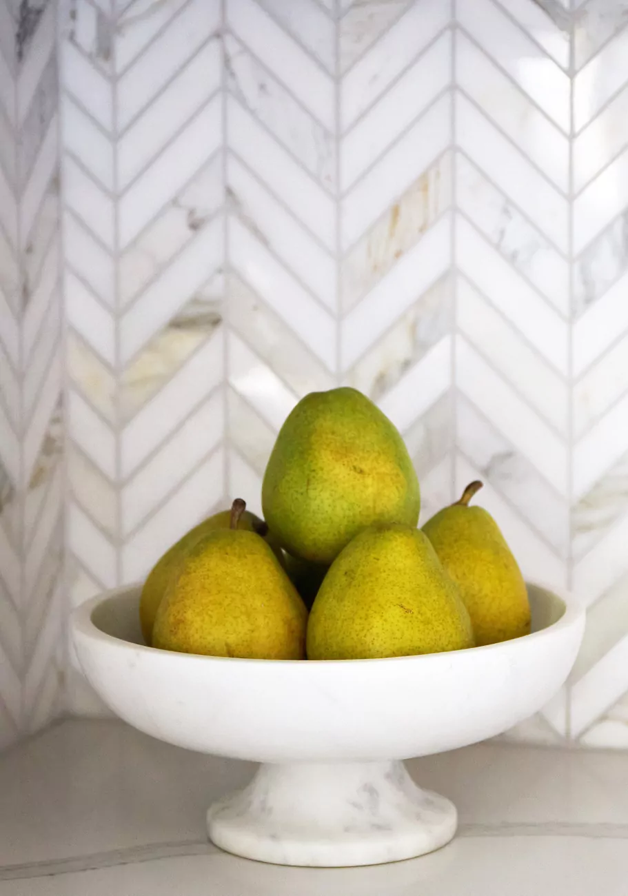 bowl-of-pears-kitchen-detail-chevron-tile-backsplash